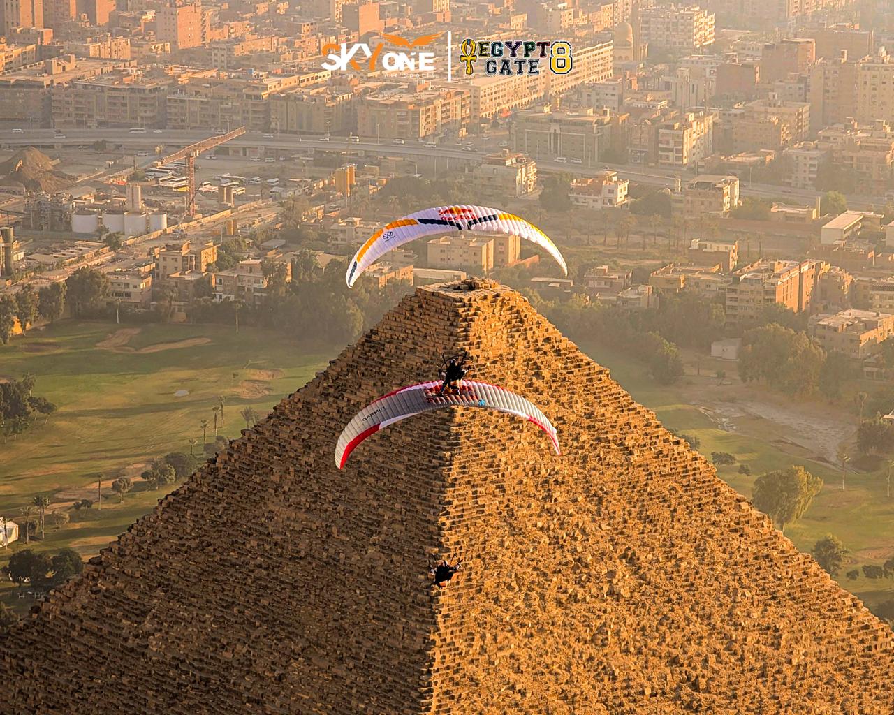 Paramotors flying over the Great Pyramid